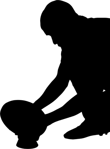 Transparent rugby ball placement on tee for kickoff preparation