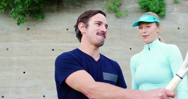 Tennis Coach Instructing Woman During Outdoor Practice - Download Free Stock Images Pikwizard.com