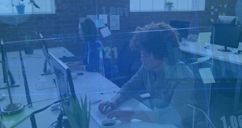 Collaborative Design Team Working in Modern Open-Plan Office