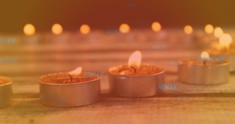 Cozy Tea Light Candles Flickering in Warm Glow