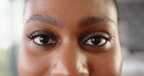 Close-up on African American Woman Eyelash and Eyebrow Elegance