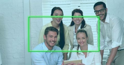 Team of Smiling Professionals Collaborating in Modern Office
