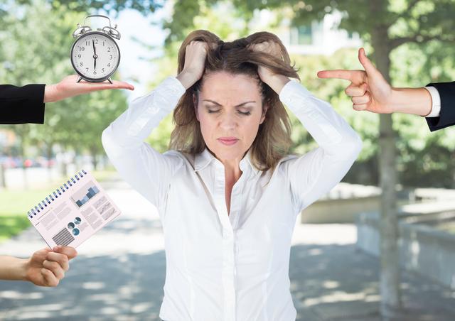 Businesswoman standing outdoors feeling overwhelmed by pressure from colleagues. One hand is holding a clock symbolizing time constraints, another pointing finger indicates accusation, and a third hand shows a report symbolizing work tasks. This image can be used in articles or blog posts about workplace stress, time management challenges, and conflict resolution at work.