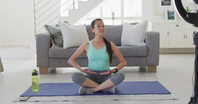 Asian Woman Filming Fitness Vlog at Home in Bright Living Room - Download Free Stock Images Pikwizard.com