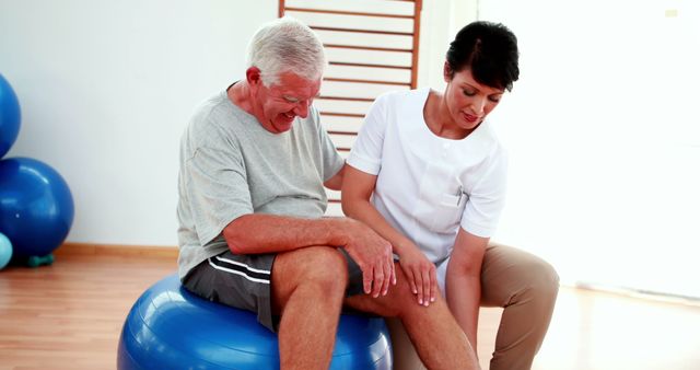 Physical therapist assists senior man with rehabilitation exercises in a fitness facility. Ideal for illustrating healthcare services for the elderly, physical therapy practices, and promoting healthy aging or senior fitness programs.