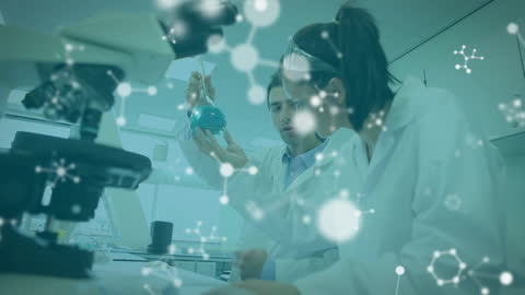 Scientists Analyzing Chemical Sample in Laboratory Setting