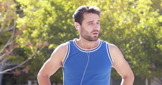 Tired Runner Taking Break Outdoors in Sunny Park - Download Free Stock Images Pikwizard.com