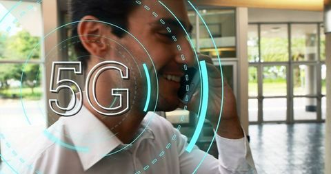 Businessman in Office Using Smartphone with 5G Technology Overlay