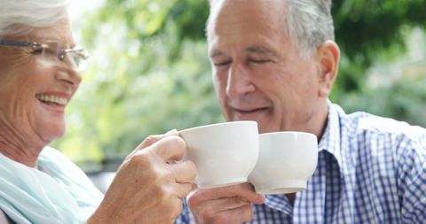 Senior Couple Enjoying Coffee Outdoors Together - Download Free Stock Images Pikwizard.com