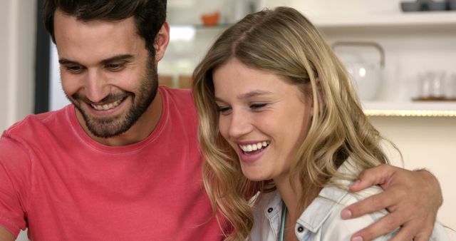 Smiling Young Couple Enjoying Time Together at Home - Download Free Stock Photos Pikwizard.com