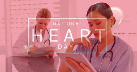 National Heart Day: Diverse Medical Professionals Using Tablets