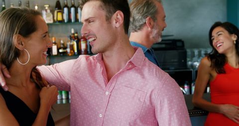 Group of Friends Enjoying Social Interaction at Cozy Bar