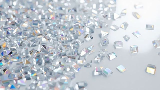 Iridescent square-cut prism crystals on white surface