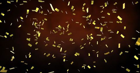 golden confetti falling on dark orange background celebration - Download Free Stock Images Pikwizard.com