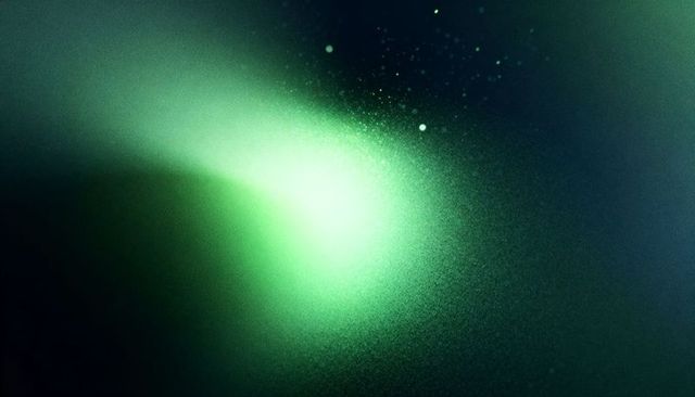 Glowing emerald nebula emitting fine particles in dark abstract cosmic background