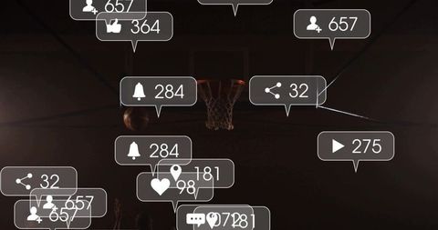 Basketball hoop receiving social media notifications, showing players silhouetted on court