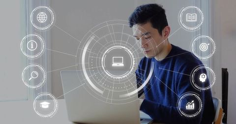 Asian man typing on laptop with holographic HUD overlay for remote work productivity