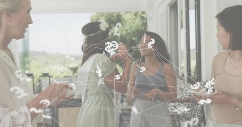 Multigenerational Women Toasting at Home with Global Currency Network Overlay