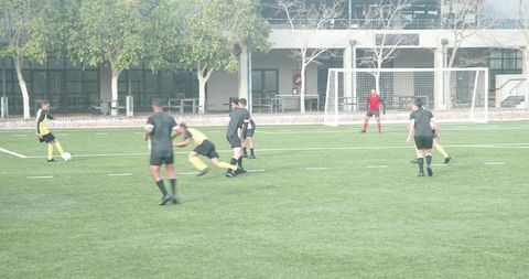 Dynamic Soccer Match Showcasing Teamwork and Competitive Spirit