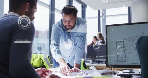 Business Collaborators Analyzing Financial Data with Futuristic Overlay