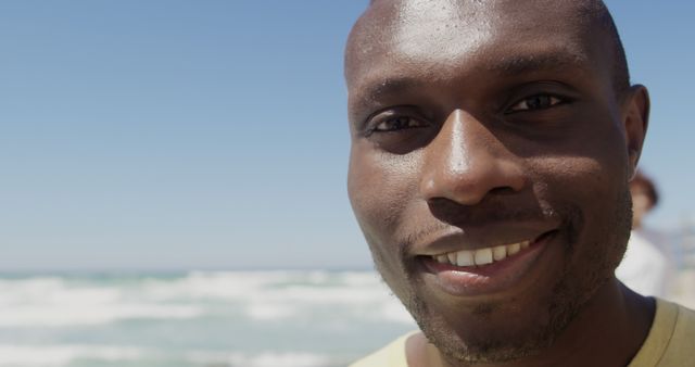 Smiling Man at the Beach Enjoying Sunny Day - Download Free Stock Images Pikwizard.com