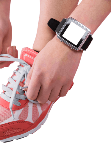Caucasian woman tying shoe wearing smartwatch - transparent background