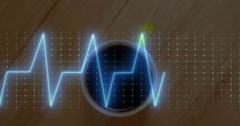 Ecg waveform and coffee mug representing energy boost concept