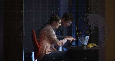 Collaborative work in modern server room with global data overlay