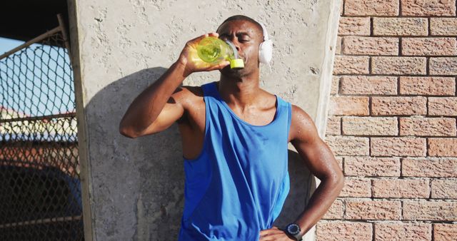 Young Man Drinking Water After Intense Workout - Download Free Stock Images Pikwizard.com