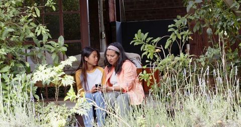 Mother-Daughter Bonding on Cozy Wooden Porch
