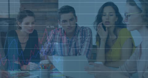 Young Professionals Analyzing Financial Data Charts