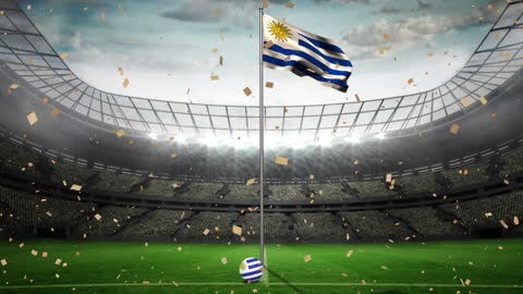Uruguay Flag Waving in Stadium with Falling Confetti