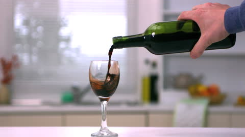 Pouring Red Wine with Flowing Motion at Home