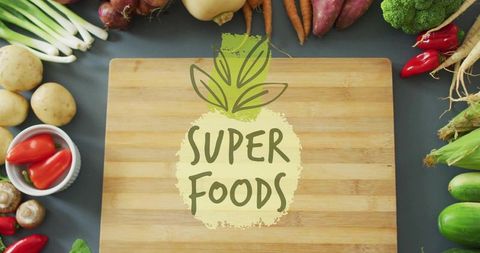 Superfoods cutting board flatlay with fresh vegetables for healthy eating and nutrition