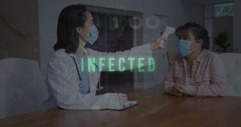 Doctor using infrared thermometer on patient during health screening