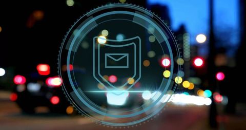Futuristic hud shield envelope overlay projecting over blurred urban night bokeh lights
