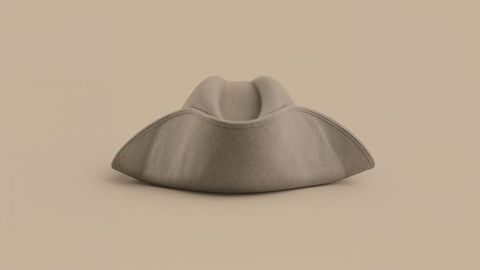 Classic grey tricorn hat on minimalist beige background