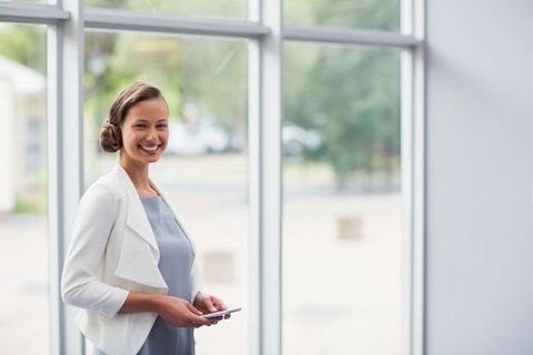 Professional Woman Networking in Modern Office Lobby
