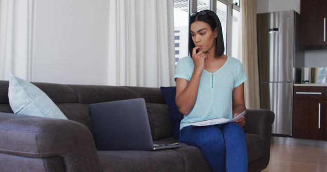 Woman Working From Home on Laptop and Documents - Download Free Stock Images Pikwizard.com