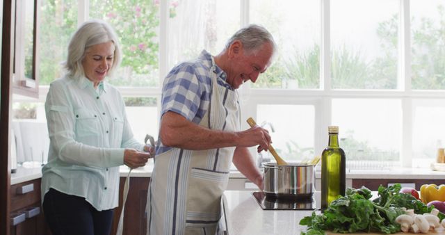 Senior Couple Enjoying Cooking Together at Home During Quarantine - Download Free Stock Images Pikwizard.com