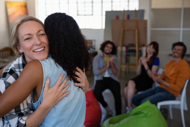 Friends Applauding Women Hugging in Art Class - Download Free Stock Photos Pikwizard.com