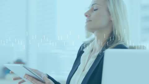 Businesswoman Using Tablet with Digital Data Overlay
