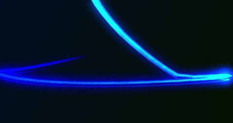 Blue and Green Neon Light Trail on Black Background