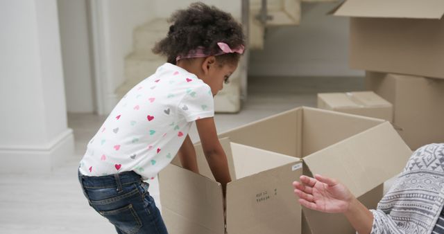 Young Girl Helping During Family Moving Day - Download Free Stock Images Pikwizard.com