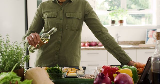 Woman Preparing Fresh Vegetables in a Bright Kitchen - Download Free Stock Images Pikwizard.com