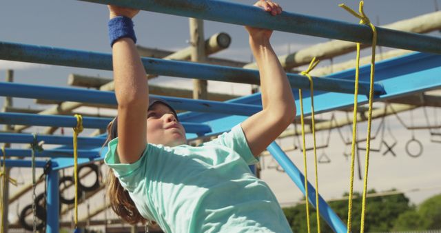 Young Girl Training on Monkey Bars in Outdoor Gym - Download Free Stock Images Pikwizard.com