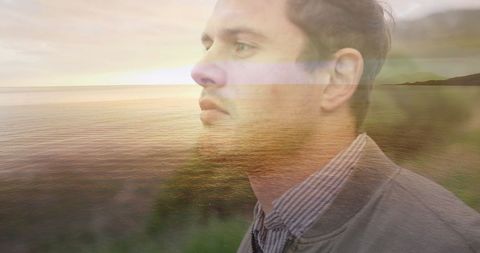 Double Exposure of Introspective Man and Serene Sea Landscape