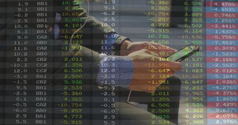 Person Checking Stock Market Data on Smartphone with Urban Background