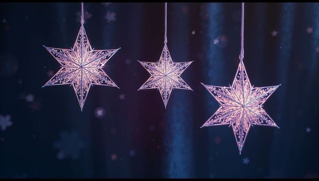 Elegant hanging star ornaments against deep blue background