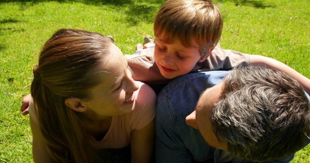 Family enjoying time together in sunlit park - Download Free Stock Images Pikwizard.com